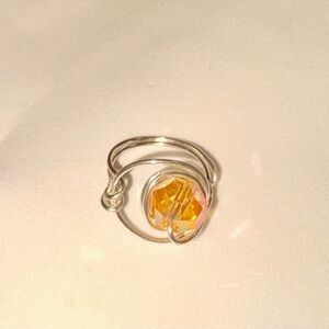 Stunning Silver Eye Ring with Amber Gemstone